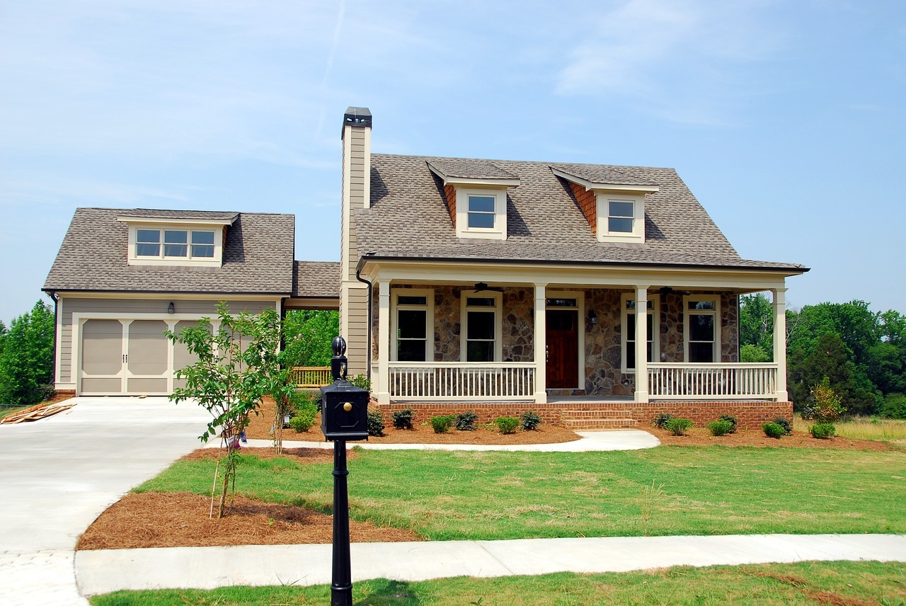 Luxury suburban home with a clean concrete driveway